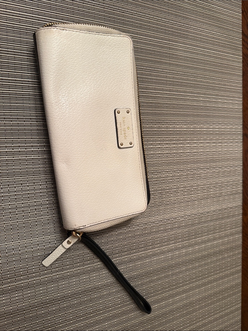 Kate Spade Cream Zip-Around Wristlet with Black Strap